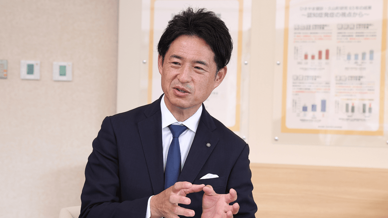 西村勝町長が久山町研究を語る写真