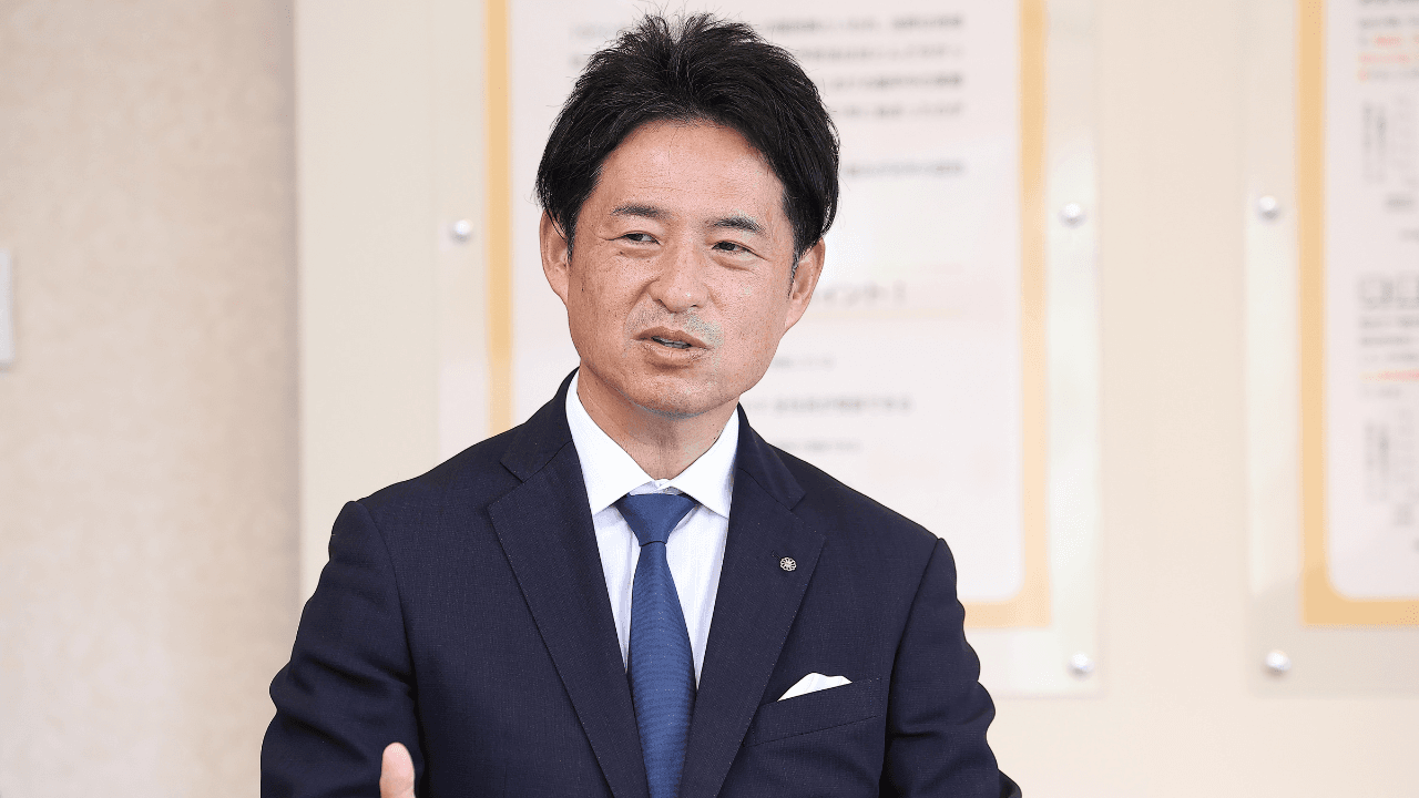 久山町長の西村勝氏が語る写真